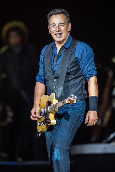 Bruce Springsteen on stage with his guitar